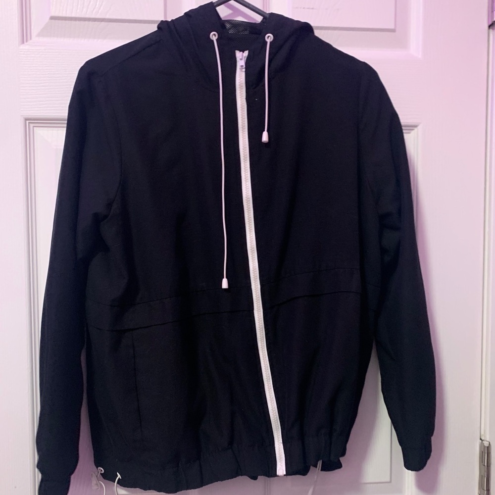 black windbreaker